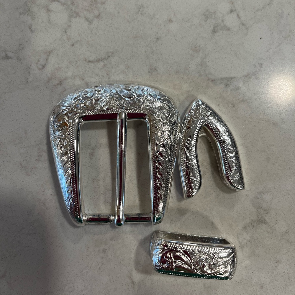 Belt Buckle. Sterling silver plated. Never used. Beautiful!
